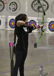 Female archer at state championship