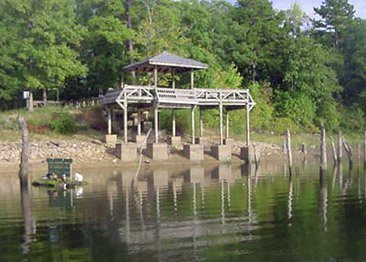 A courtesy dock at Lake Wilhelmina completely out of the water during the 5-foot drawdown. 