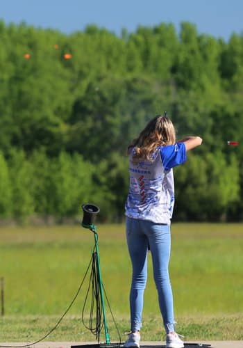 Female shooter smashes clay