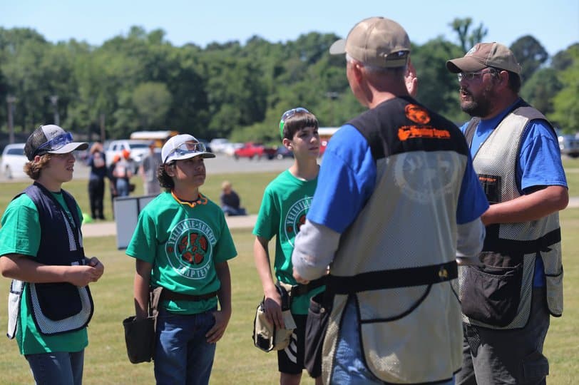 Shooters get safety talk and competition rules before shooting.