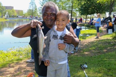Family enjoying day at a FCFP pond catching catfish