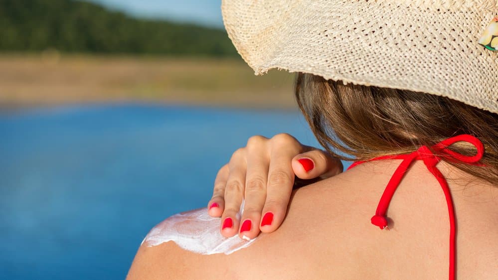Applying sunscreen, not suntan lotion, will help prevent sunburn and skin diseases later in life, but you have to apply it regularly throughout the day.