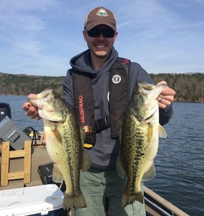 Chris Middaugh with two large bass
