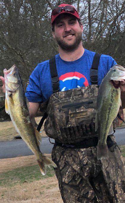 Carson Holloway caught this walleye and largemouth bass on the Saline River using brooder minnows this past week. Photo provided by Lisa Spencer.