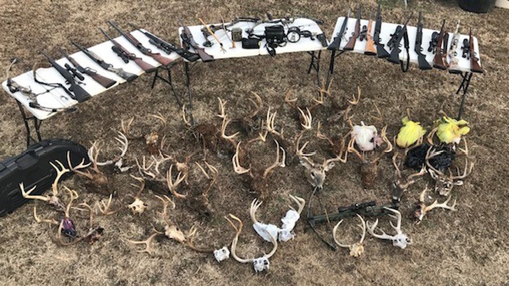 Heads and weapons confiscated as evidence in the case