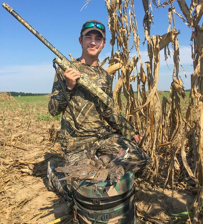 Hunter with his mourning dove bounty