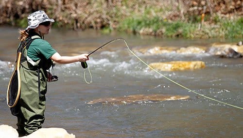 Woman fly-fishing on Dry Run Creek