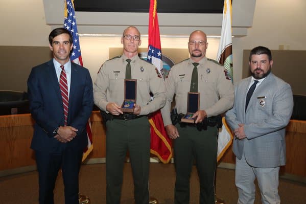 From left to right: AGFC Director Austin Booth, Wildlife Officer Chris Crawford, Cpl. Ray Hines and Col. Brad Young.