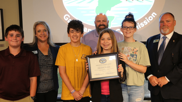 Group image  Mountain Home Teacher and a few students from his class at Pinkston Middle School presented at Thursday’s meeting of the AGFC.