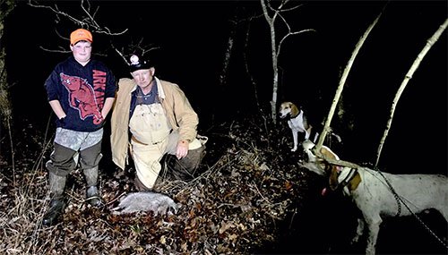 Coon hunting with dogs