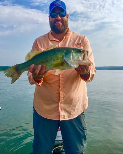 Ben Batten, Deputy Director with largemouth bass