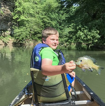 Junior Biologist, Jacob Schroeder, with a nice Cadron Creek Bluegill.