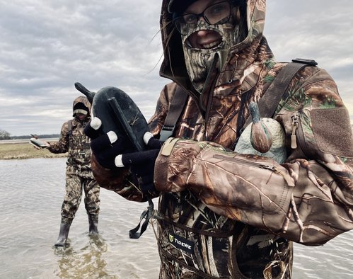 Hunters with decoys: Two students continued to pursue their first ducks using the AGFC’s Waterfowl Rice Incentive Conservation Enhancement program. Photo by Randy Zellers, AGFC.