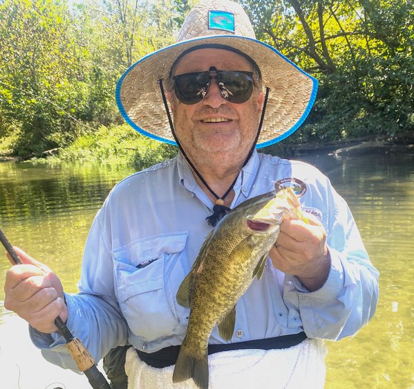 The author with a nice smallmouth bass from the Ouachita River