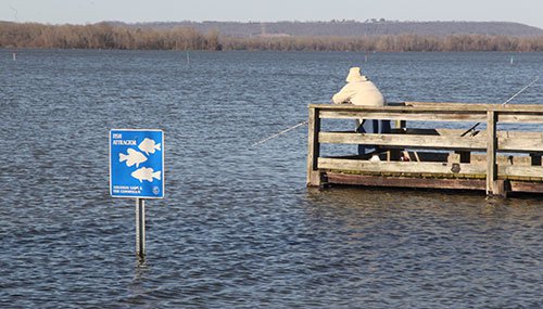 Lake Overcup fishing off pier next to a fish attractor