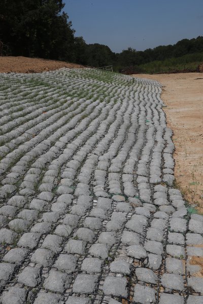 flexamat reinforcements combine with riprap to prevent future erosion