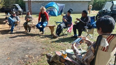 AGFC staffer Lea White talks with young hunters about hunting ethics and safety.