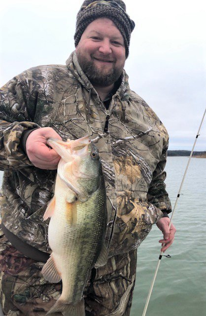 Jason Lenard of Spring, Texas, who is Lou Gabric's son-in-law, caught this largemouth bass (4 pounds, 2 ounces) on a Berkley Flicker Minnow over a brush pile that was in 30 feet of water in Norfork Lake.