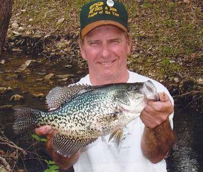 Master Angler holding a record crappie catch