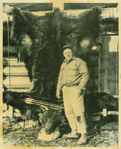 Dr. Rex Hancock with black bear