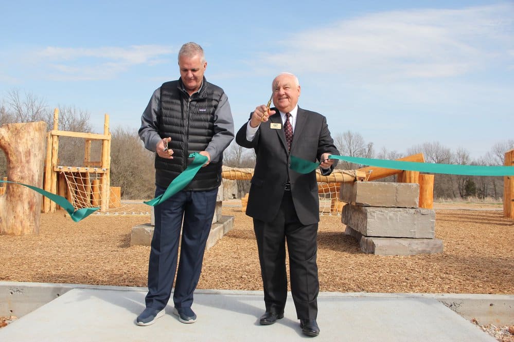 Springdale Mayor Doug Sprouse (left) and AGFC Chairman Bobby Martin officially cut the ribbon to the latest addition to the nature center’s outdoor exhibits.