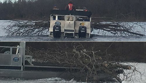 AGFC barge loaded with trees