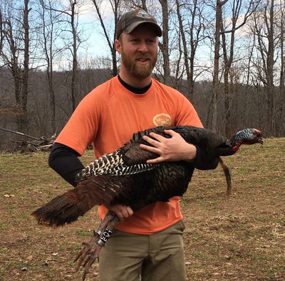 Jeremy Wood with banded jake turkey