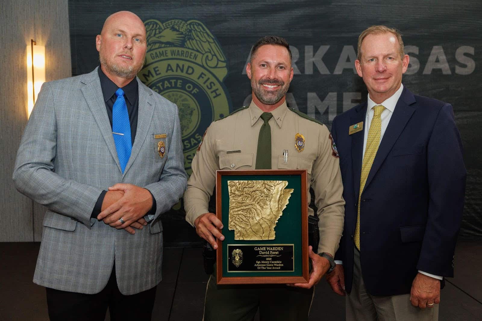 THREE MEN AND AWARD