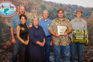 Lynn Keener and Sons accepting their Deer Management Assistance Program Club of the Year Award.