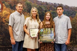 Lance & Audra Coffman accepting their Fisheries Habitat Landowner Award.